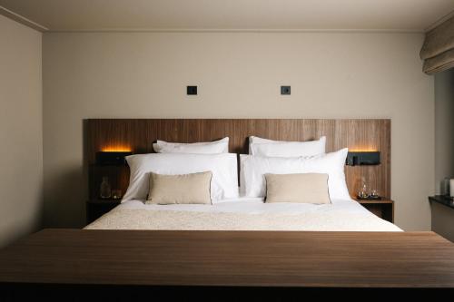 Postel nebo postele na pokoji v ubytování Hotel Blink