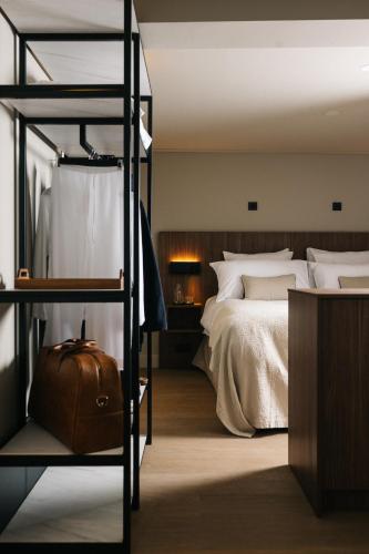 Postel nebo postele na pokoji v ubytování Hotel Blink