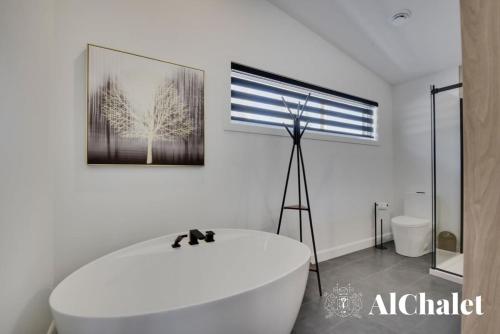 Koupelna v ubytování Achille - Boisé avec spa et sauna