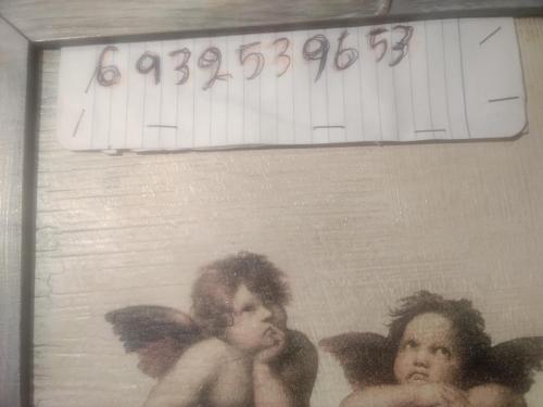 een foto van twee engelen op een vel papier bij Cozy house Ioannina neokesaria in Neokaisáreia