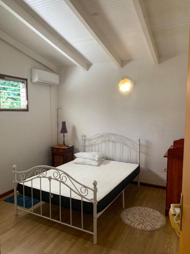 מיטה או מיטות בחדר ב-Chez LULU