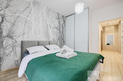 מיטה או מיטות בחדר ב-Ilumino Prestige by LookAp - Centrum