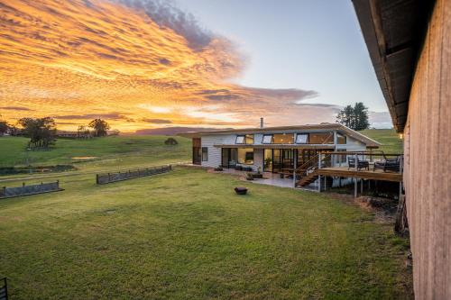 an aerial view of a house with a large yard at The Overflow Blue Mountains in Kanimbla