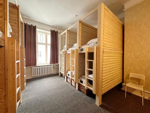 Postel nebo postele na pokoji v ubytování Imaginary Hostel