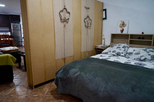 Ένα ή περισσότερα κρεβάτια σε δωμάτιο στο Casa Krecheu Loft