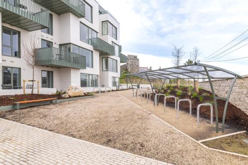 a row of plants in front of a building at The Lookout in Dublin