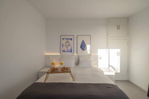 Postel nebo postele na pokoji v ubytování Finca Las Huellas - Moderno apartamento con vistas al mar y al volcán