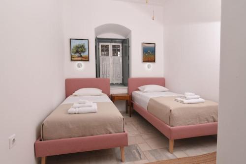 Ένα ή περισσότερα κρεβάτια σε δωμάτιο στο Mansion Veranda