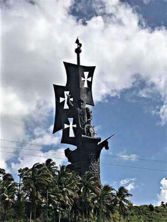 a statue with stars on top of a building at Casita Linda in Arecibo