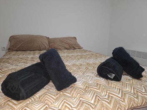 Postel nebo postele na pokoji v ubytování Spic Apartmani