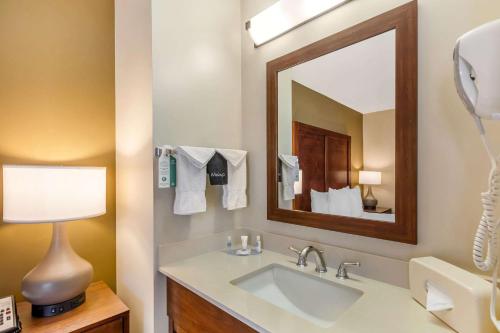 a bathroom with a sink and a mirror at Comfort Inn Monterey Park - Los Angeles in Monterey Park