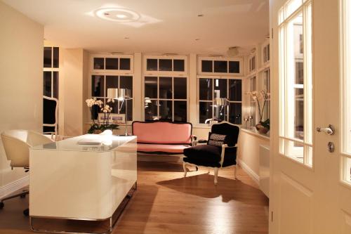 Coin salon dans l'établissement Hotel Norderriff