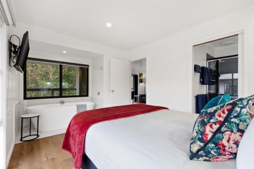 Ένα ή περισσότερα κρεβάτια σε δωμάτιο στο Hepburn Springs Accommodation