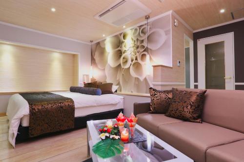 Postel nebo postele na pokoji v ubytování HOTEL A La Mode -アラモード-