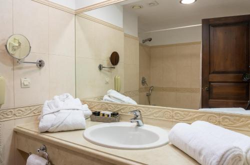 Koupelna v ubytování Likoria Hotel
