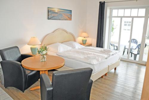 Letto o letti in una camera di Appartementhaus am Strand m Balkon Göhren OR 01-09