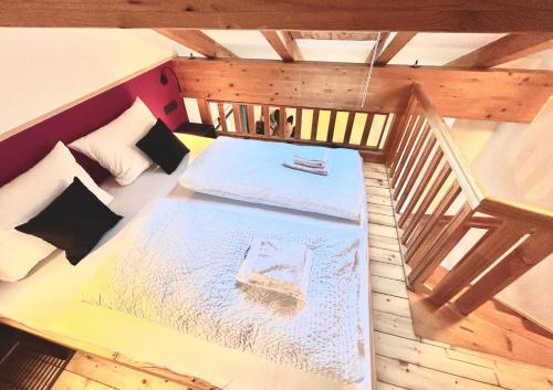 an overhead view of a bed in a room at Ferienwohnung "Bergzeit" in Bad Wiessee