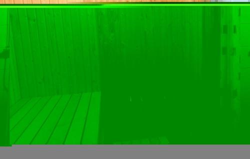a green wall with at Awesome Home In Bolmsö With Sauna in Bolmsö
