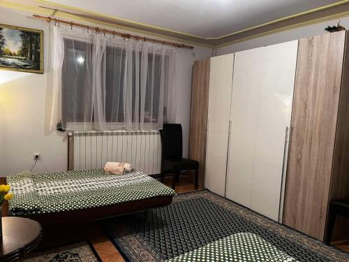 מיטה או מיטות בחדר ב-Apartman 23