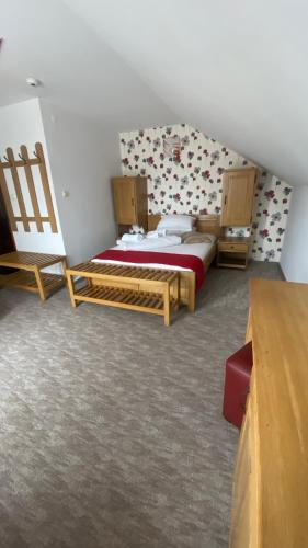 a bedroom with two beds in a room at Pension La Viorel Isaila in Sibiu