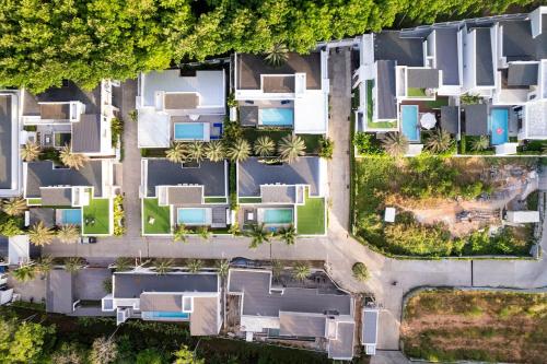 an overhead view of houses in a suburb at Menara - 3 BR Private Pool Villa - Moroccan Inspired - Bangtao Beach in Phuket