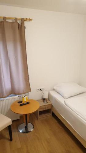 Letto o letti in una camera di Pension Seevetal