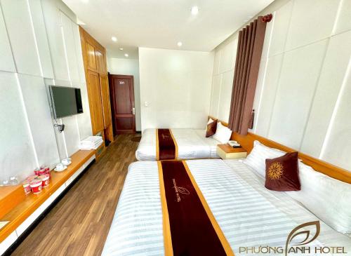 TV a/nebo společenská místnost v ubytování Phuong Anh Hotel