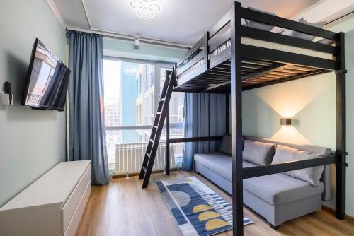 Двухъярусная кровать или двухъярусные кровати в номере Apart Hotel 2