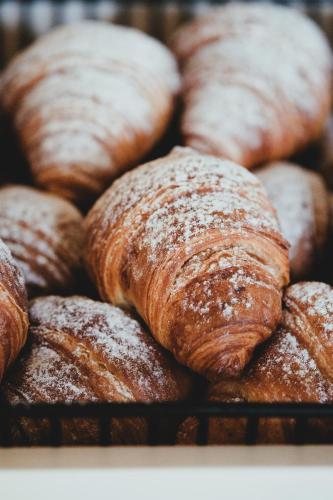 a bunch of pastries sitting on a tray at Prinsotel Alba & Spa in Cala d´Or