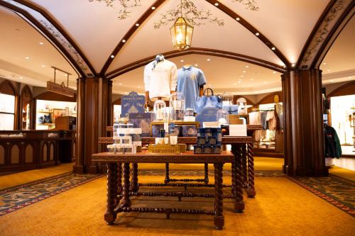 a display case in a store with clothes on display at Disneyland® Hotel in Chessy