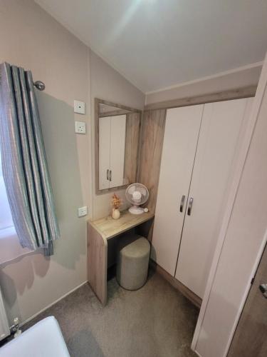 A bathroom at A22 Holiday Resort Unity Brean Passes Included Sleeps 8 people 3 bedrooms No pets No workers sorry