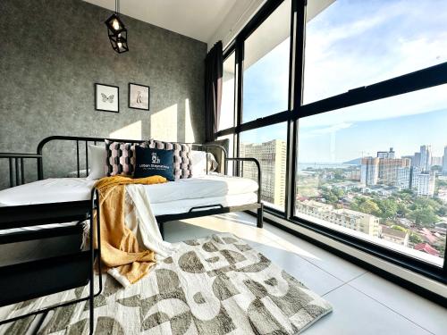 Katil atau katil-katil dalam bilik di New 2BR OR 3BR Serenity Homestay at Urban Suite by URBAN STAYCATIONS LOD
