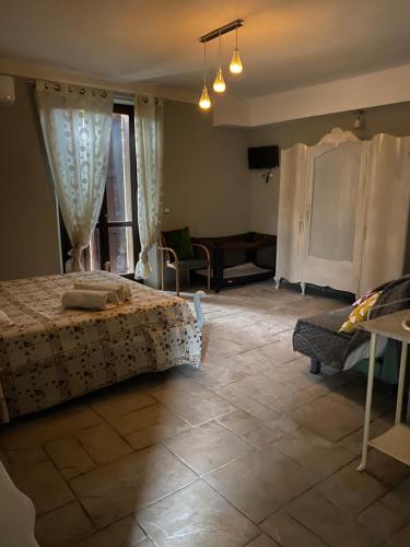 Postel nebo postele na pokoji v ubytování Cascina natura relax e piscina