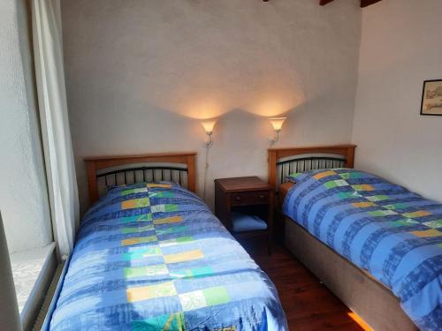Uma cama ou camas num quarto em 381 Glassillaun Cottage