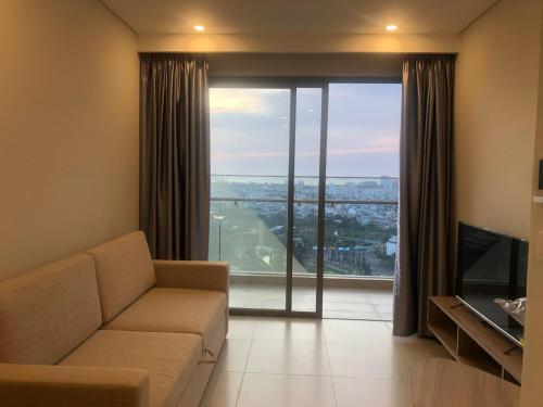 TV a/nebo společenská místnost v ubytování The Song Apartment Vung Tau Sea view