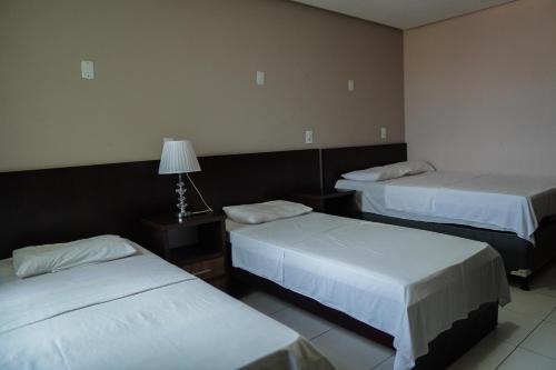 Amazônia Palacce Hotelにあるベッド