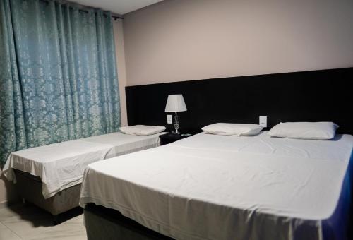 Amazônia Palacce Hotelにあるベッド