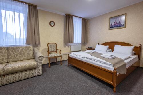 Postel nebo postele na pokoji v ubytování Hotel Express Корпус 2
