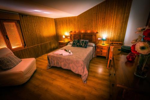 Postel nebo postele na pokoji v ubytování Casa Rural Aguas Frías I