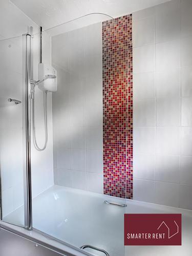 a shower in a bathroom with a red tile wall at Lightwater - 1 Bedroom House - With Parking in Bagshot