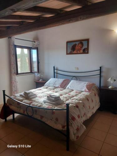 Ένα ή περισσότερα κρεβάτια σε δωμάτιο στο Agriturismo La Verde Rosa