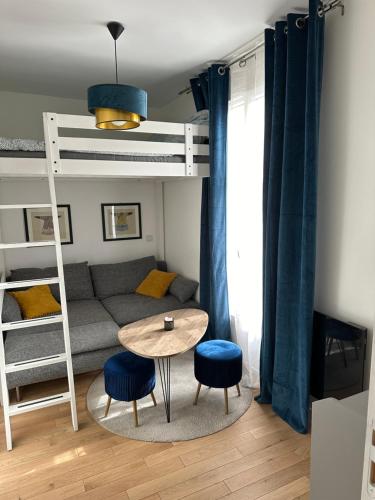 Krevet ili kreveti na kat u jedinici u objektu Suite Ourcq, Paris 19 - La Villette, Buttes Chaumont