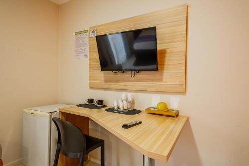 TV a/nebo společenská místnost v ubytování Hotel Yvera Cataratas