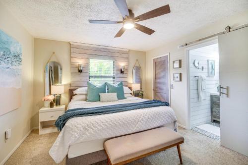 a bedroom with a bed and a ceiling fan at Port St Lucie Retreat Lanai with Private Pool! in Port Saint Lucie