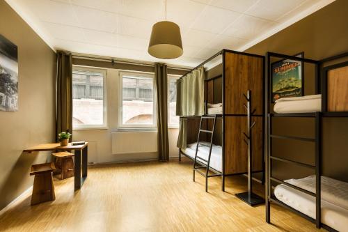 a room with bunk beds in a hostel at Five Reasons Hostel & Hotel in Nürnberg