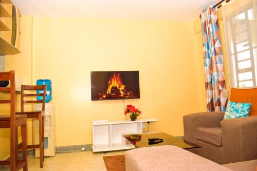 Μια τηλεόραση ή/και κέντρο ψυχαγωγίας στο Two bedroom bnb in thika town