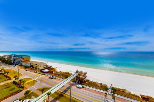 an aerial view of a beach and the ocean at Surfside Resort in Destin