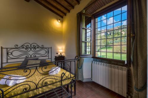 Postel nebo postele na pokoji v ubytování Casale Fontocchio