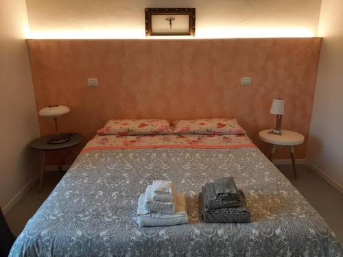 Llit o llits en una habitació de Casa Vacanze La Vecchia Fonte