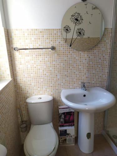 Bathroom sa Casa Orchidea Sortino